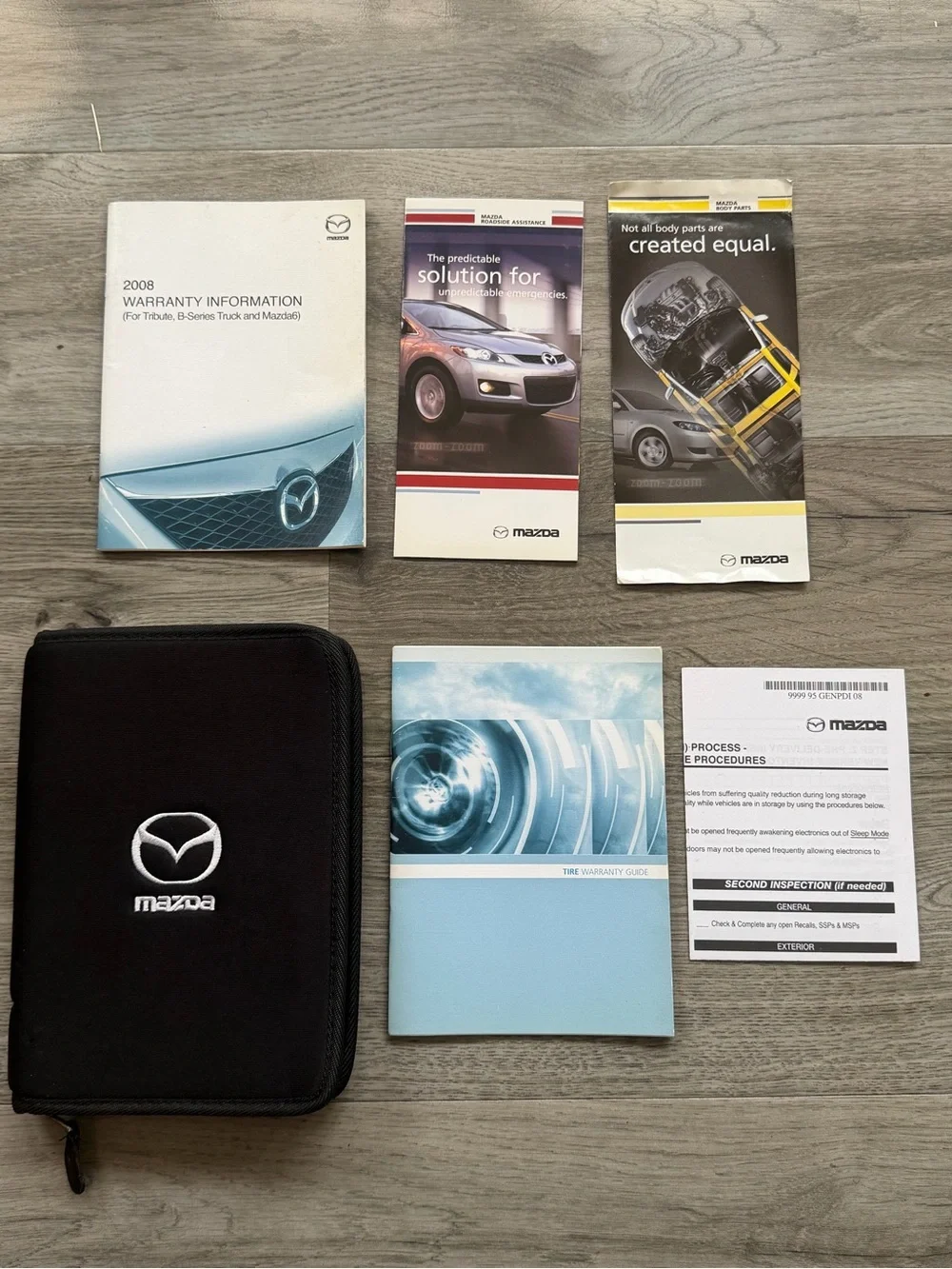 2008 Mazda OEM Drivers Handbook Manual in Black Zip Around Case